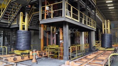 Group of rebar on a machine in a concrete factory