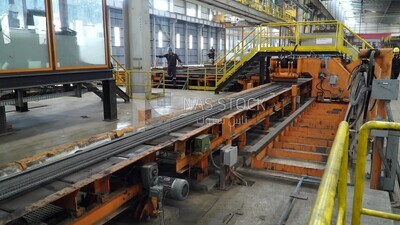 Concrete columns on the conveyor belt of the iron and steel factory machine