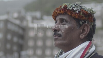 Saudi man wearing a wreath of Asir roses, Rijal Almaa village, Asir, Saudi Arabia