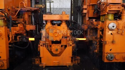 Glowing steel parts in a metal factory