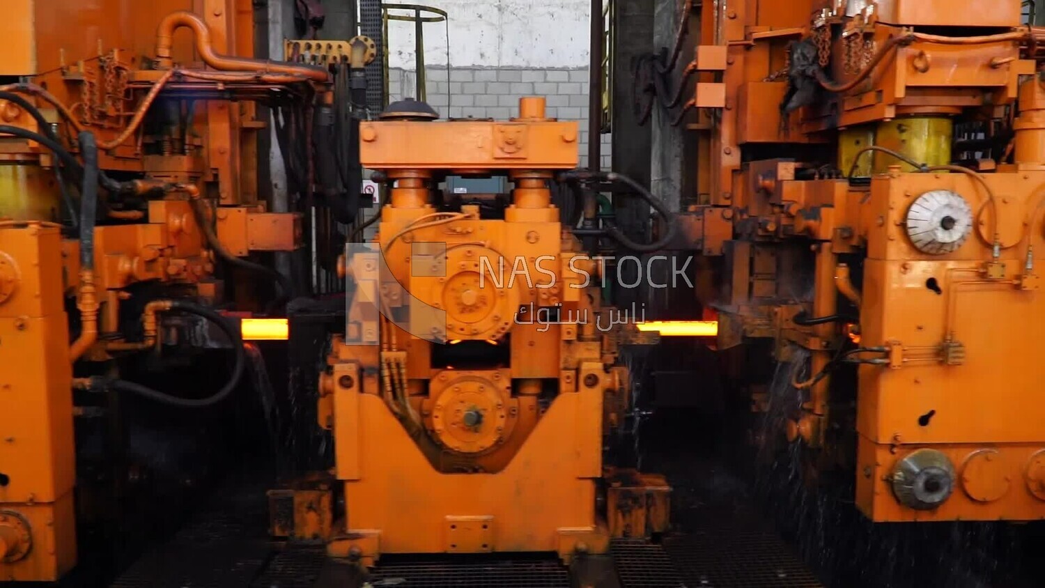 Glowing steel parts in a metal factory