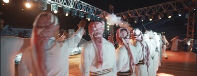 Group of men dancing and celebrating in Rijal Almaa village, Asir, Saudi Arabia