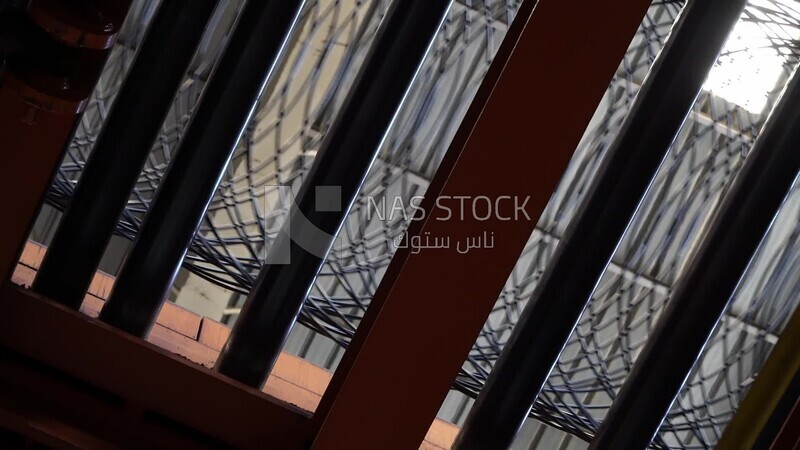 Rebar on a conveyor belt in an iron and steel factory