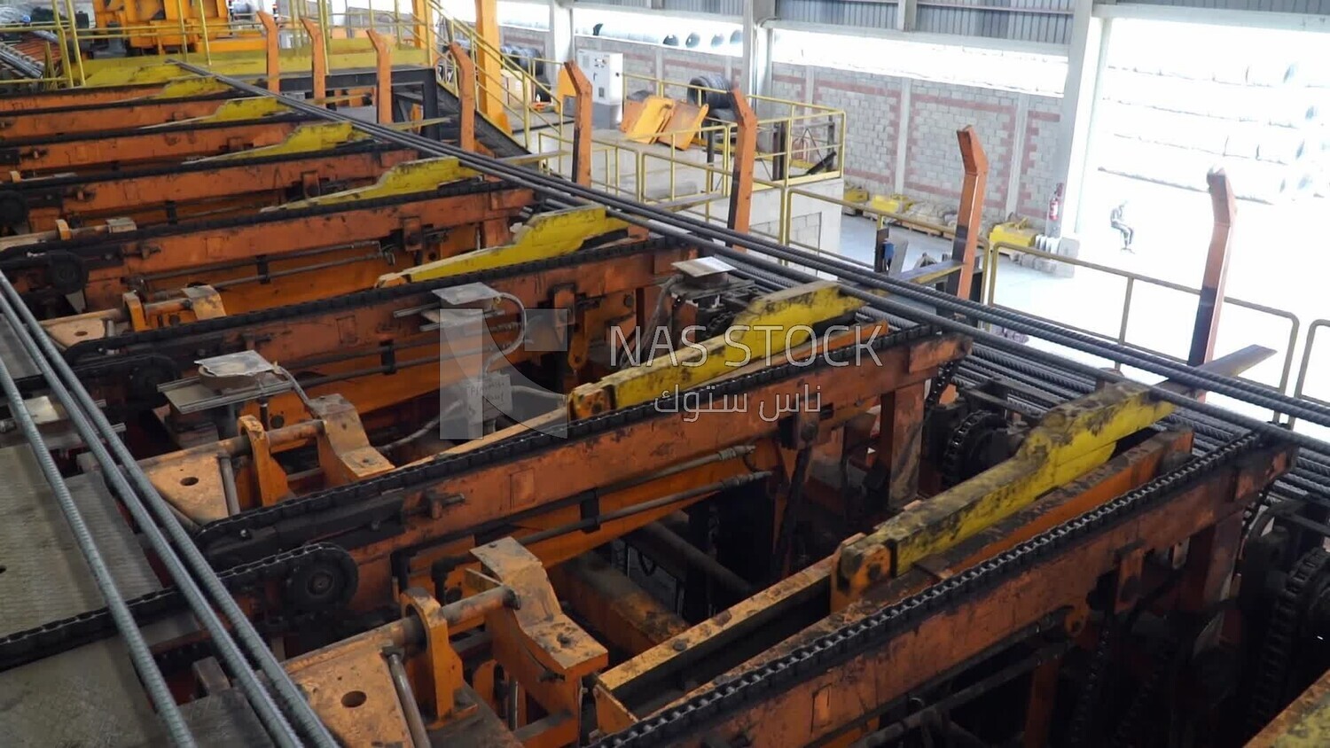 Concrete bars on the conveyor belt in the iron and steel factory