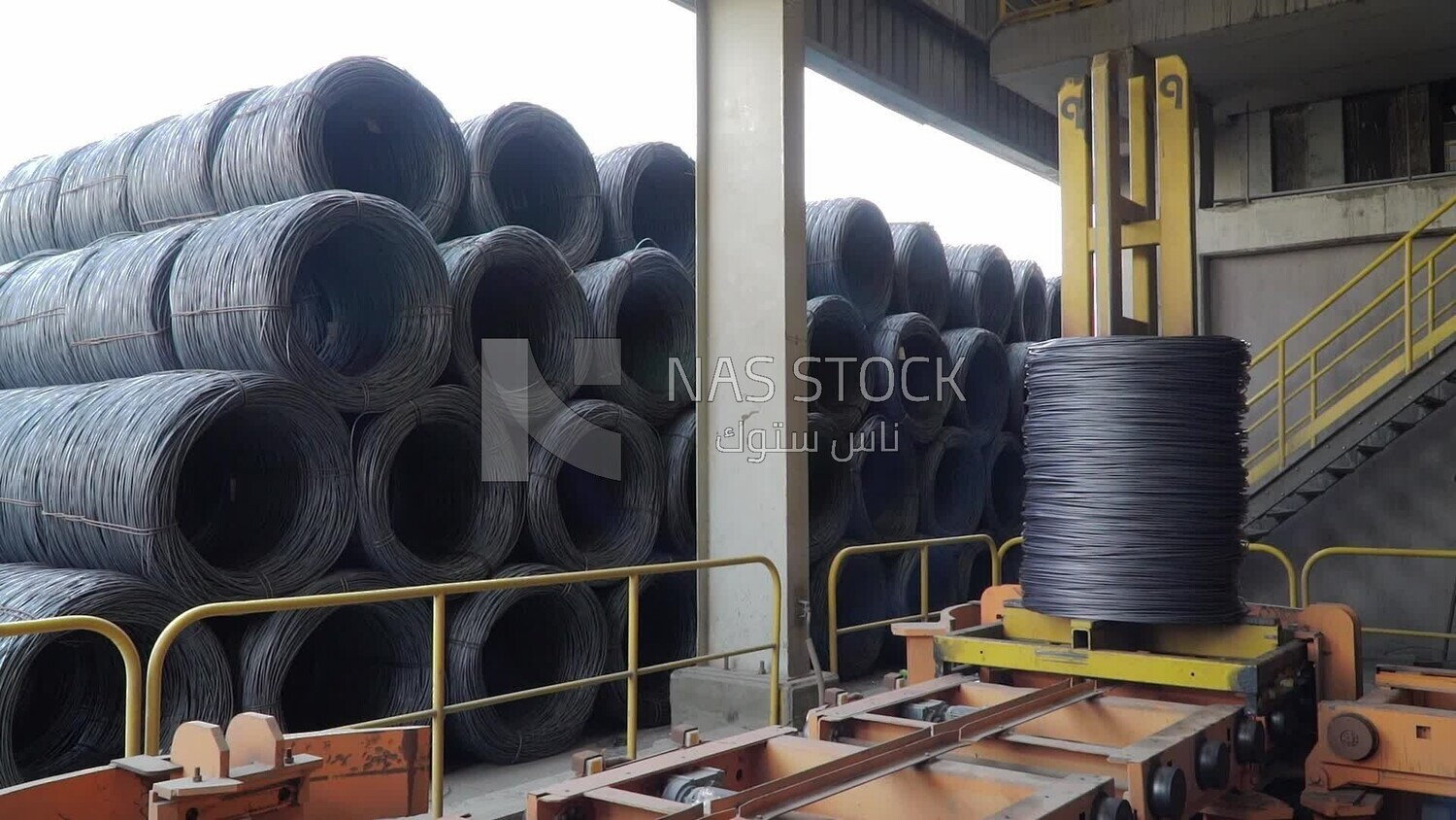 large group of rebar bundles in a steel production plant