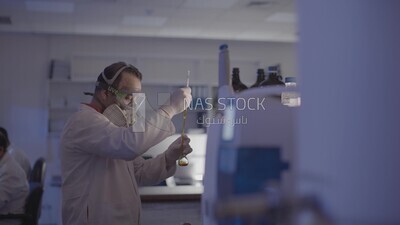 Chemist who formulates a drug in the laboratory