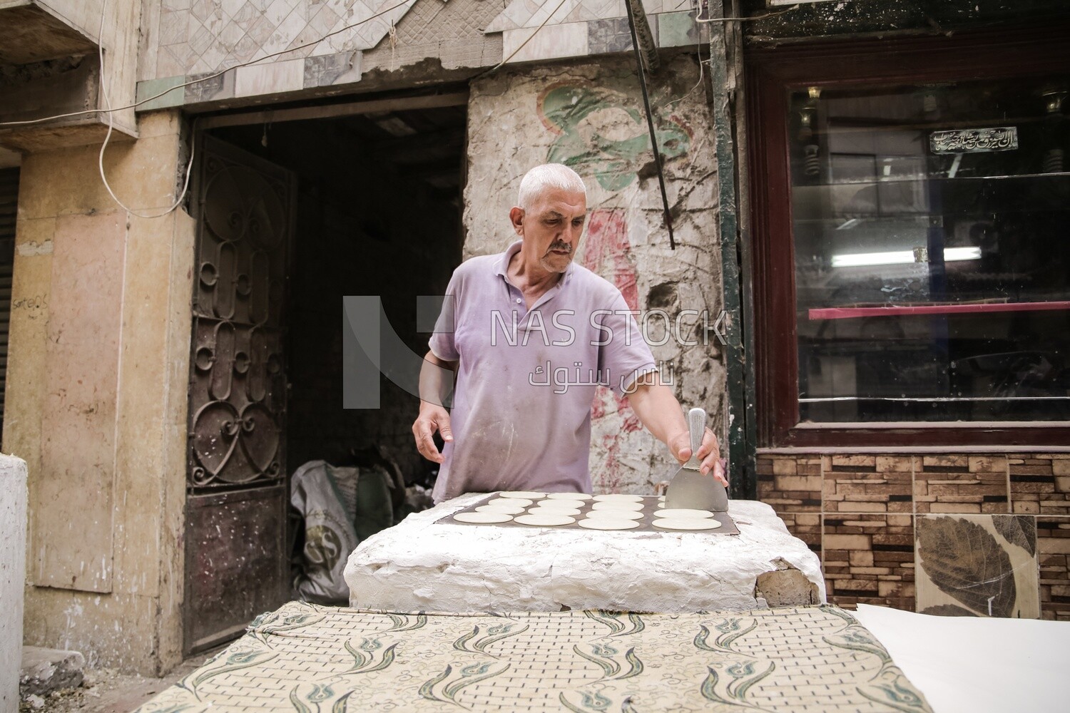 Egyptian seller who makes Qatayef