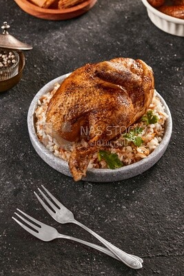 Side view of scene from plate of rice with chicken