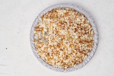 Top view of a plate of Classic Egyptian Rice with Vermicelli  on a white background