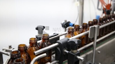 Stage of filling the drug into bottles in a pharmaceutical factory