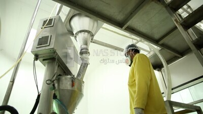 Man in a medicine factory from inside