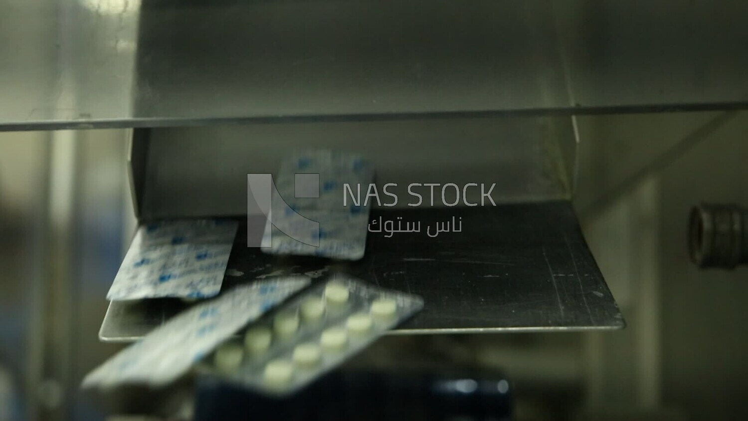 Stage of assembling the drug strips after packaging and pressing them