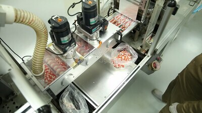 Specialist who removes invalid Medication tablets from the manufacturing stage