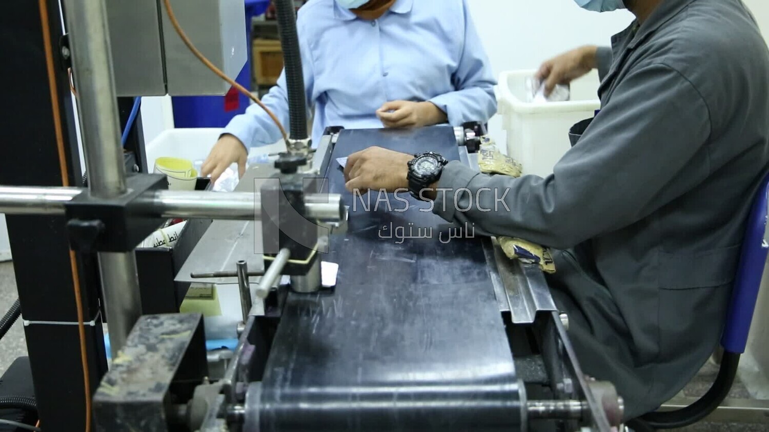 Two doctors ensure the safety and quality of the Medication tablets and then fill them in the designated boxes