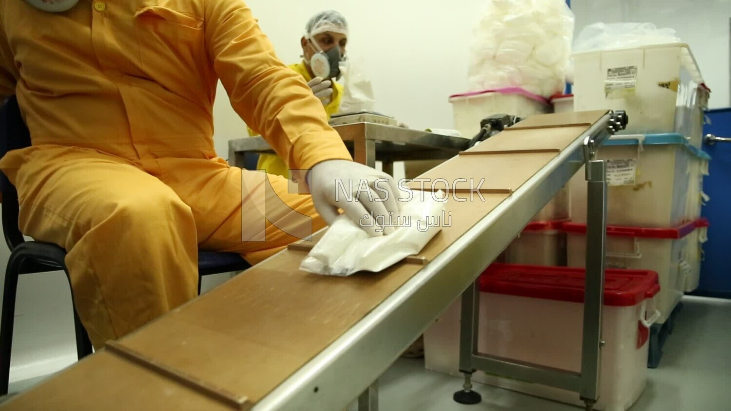 Specialist who collects medicine bags to fill them and ensure their safety