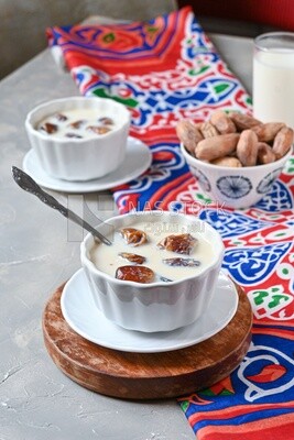 Two bowls of dates milk, healthy and useful juice, ramadan juice.
