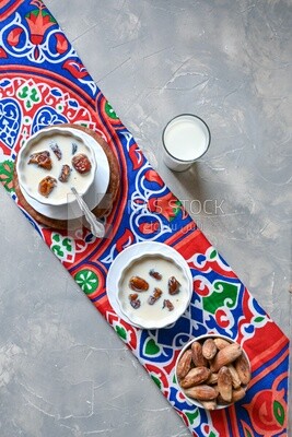 Two bowls of dates milk, healthy and useful juice, ramadan juice.