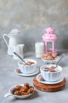 Two bowls of dates milk, healthy and useful juice, ramadan juice.