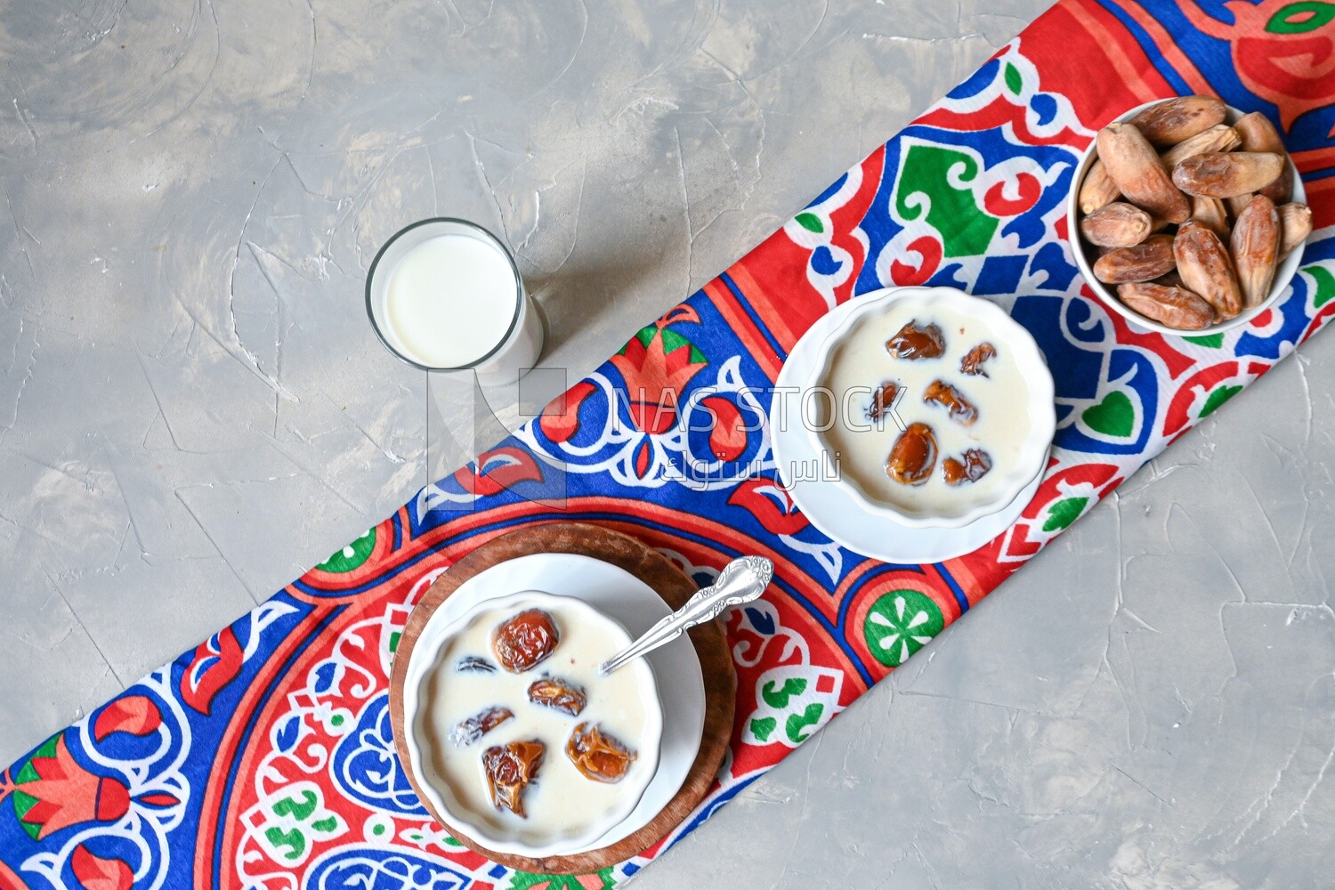 Two bowls of dates milk, healthy and useful juice, ramadan juice.