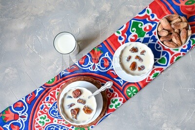 Two bowls of dates milk, healthy and useful juice, ramadan juice.