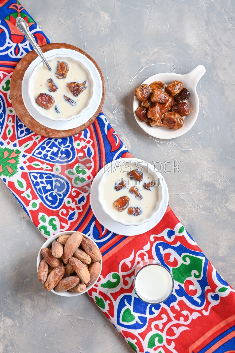 Two bowls of dates milk, healthy and useful juice, ramadan juice.