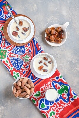 Two bowls of dates milk, healthy and useful juice, ramadan juice.