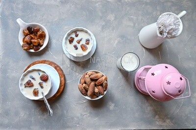 Two bowls of dates milk, healthy and useful juice, ramadan juice