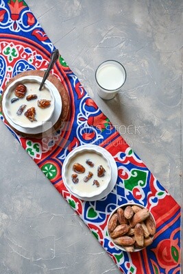 Two bowls of dates milk, healthy and useful juice, ramadan juice