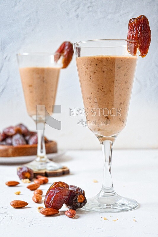 Two cups of dates milk, healthy and useful juice, ramadan juice