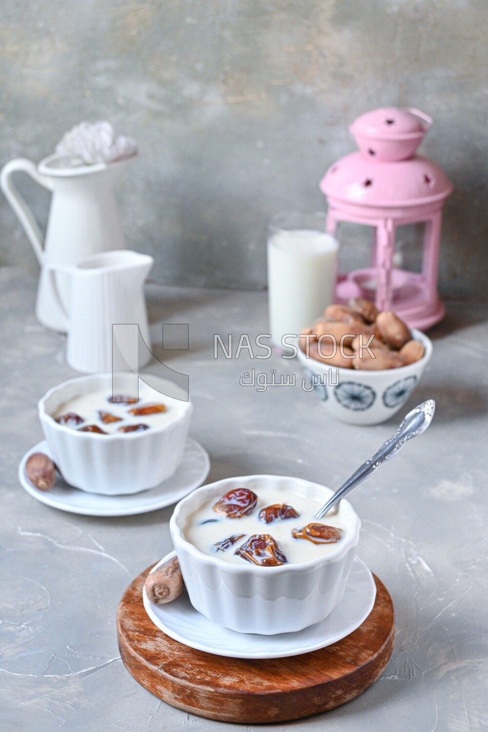 Two bowls of dates milk, healthy and useful juice, ramadan juice.