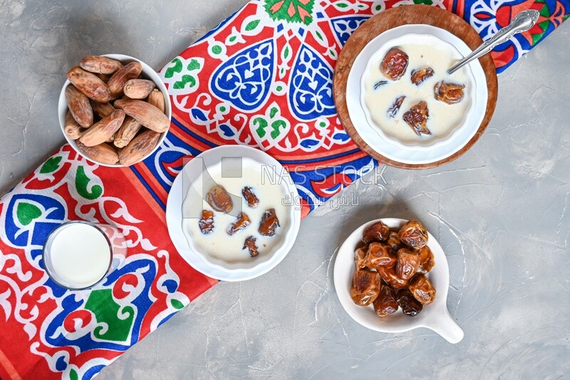 Two bowls of dates milk, healthy and useful juice, ramadan juice
