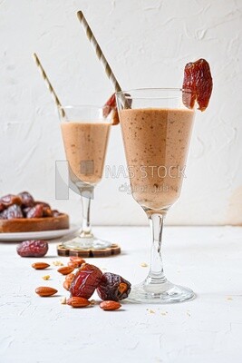 Two cups of dates milk, healthy and useful juice, ramadan juice