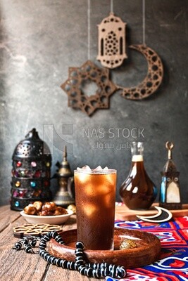 Cup of licorice juice with ice, ramadan juice