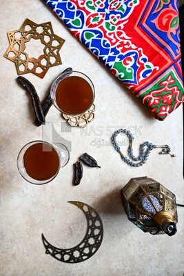 Two cups of carob with carob sticks, cold drinks, delicious natural juices, healthy and useful juice