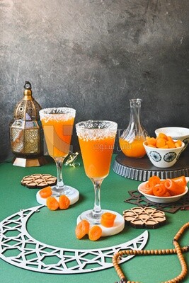 Two cups of Qamar Al Deen juice with dried apricots, Ramadan juice