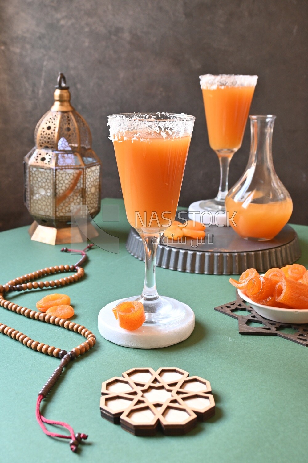 Two cups of Qamar Al Deen juice with dried apricots, Ramadan juice