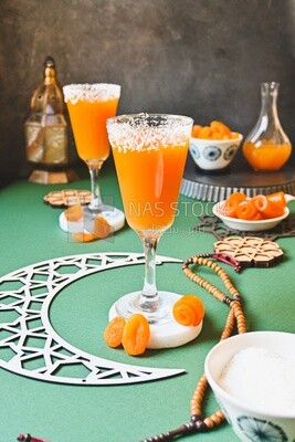 Two cups of Qamar Al Deen juice with dried apricots, Ramadan juice
