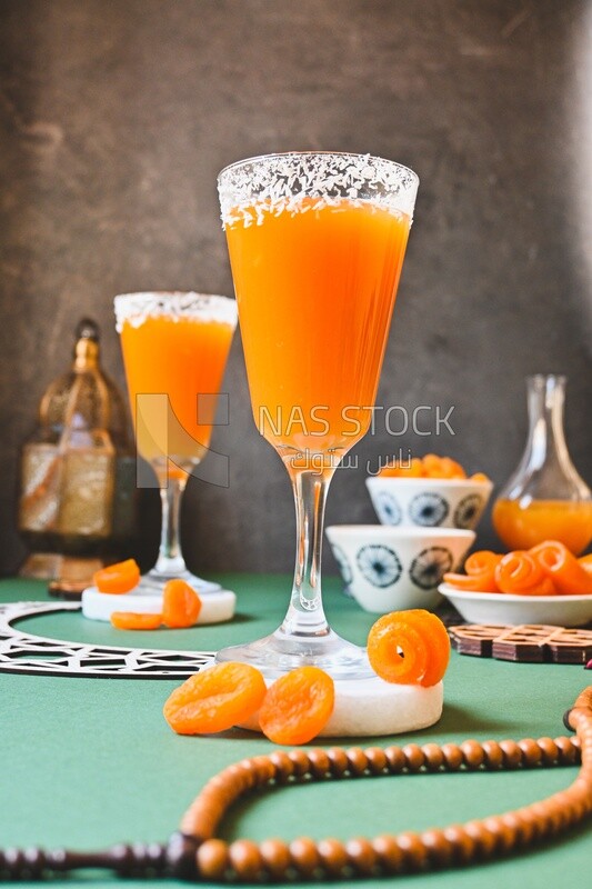 Two cups of Qamar Al Deen juice with dried apricots, Ramadan juice