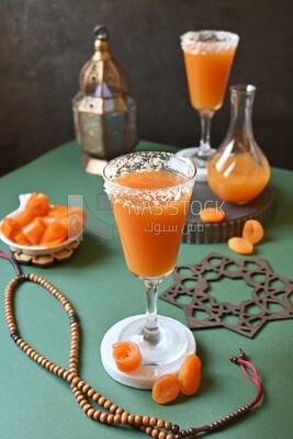 Two cups of Qamar Al Deen juice with dried apricots, Ramadan juice