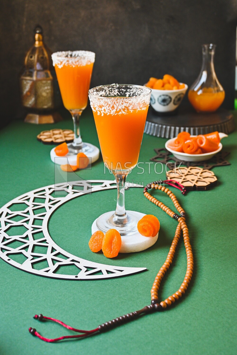 Two cups of Qamar Al Deen juice with dried apricots, Ramadan juice