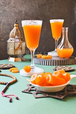 Two cups of Qamar Al Deen juice with dried apricots, Ramadan juice