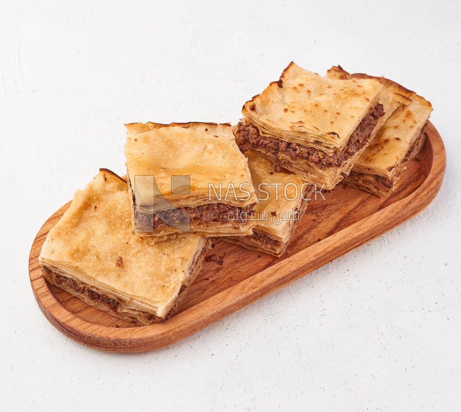 crispy Phyllo Meat Pie (Egyptian Goulash), recipes and delicious food dishes, popular Arabic food
