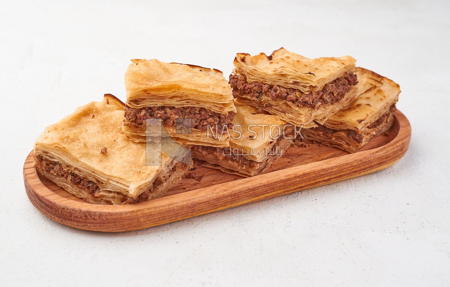 crispy Phyllo Meat Pie (Egyptian Goulash), recipes and delicious food dishes, popular Arabic food