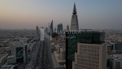 drone footage of  Al-Faisaliah Tower in Riyadh, the towers on King Fahd Road, famous towers in Riyadh, Riyadh roads and streets, car traffic in Riyadh