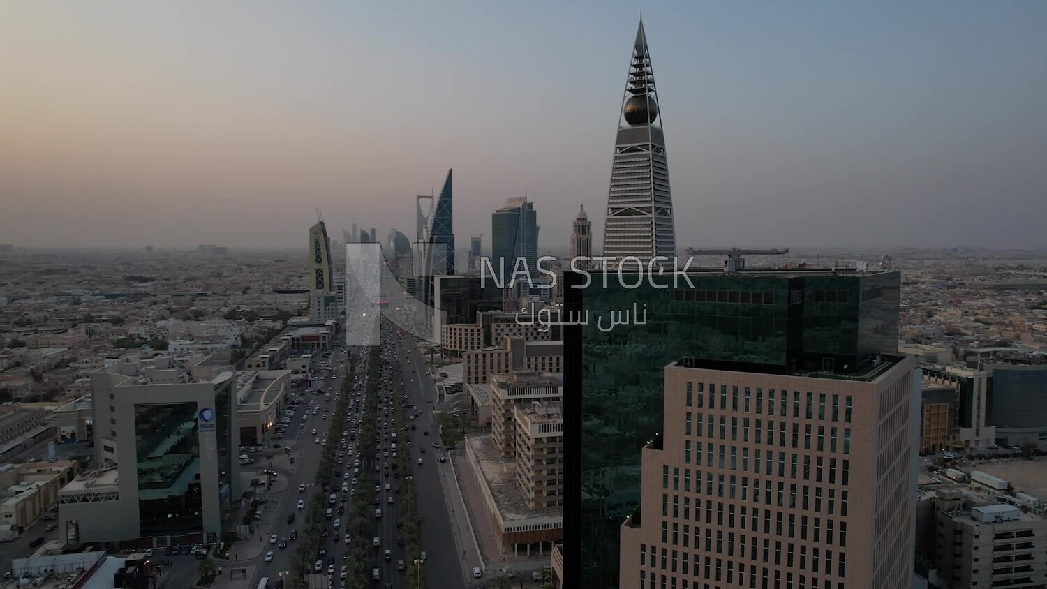drone footage of  Al-Faisaliah Tower in Riyadh, the towers on King Fahd Road, famous towers in Riyadh, Riyadh roads and streets, car traffic in Riyadh