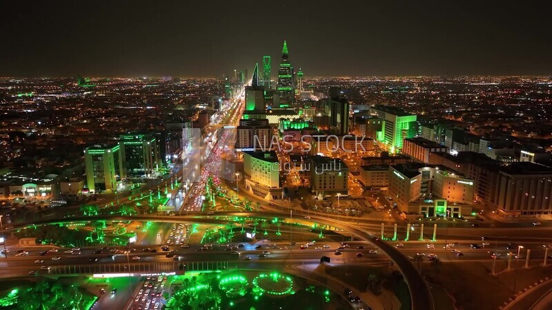 drone footage of car traffic on the highway in Riyadh,  tourism in Saudi Arabia, Saudi Arabia at night, Saudi national day, Cairo Square, Riyadh roads and streets, green lights