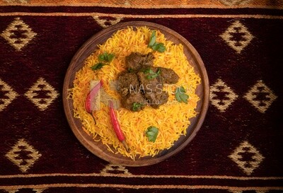 Wooden plate of delicious biryani rice with meat,  traditional Arabic dishes, Arabic food, popular dishes, delicious recipes and dishes, delicious food