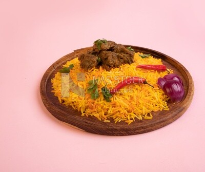 Wooden plate of delicious biryani rice with meat,  traditional Arabic dishes, Arabic food, popular dishes, delicious recipes and dishes, delicious food