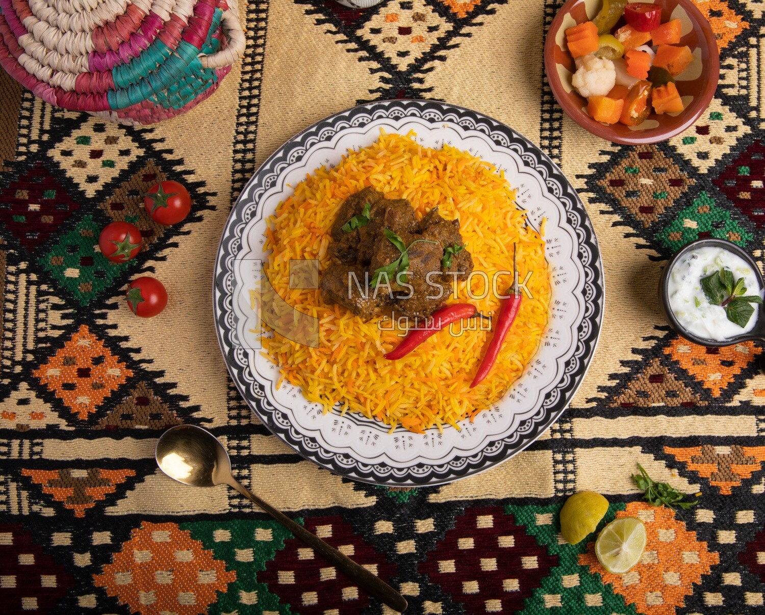 Wooden plate of delicious biryani rice with meat,  traditional Arabic dishes, Arabic food, popular dishes, delicious recipes and dishes, delicious food