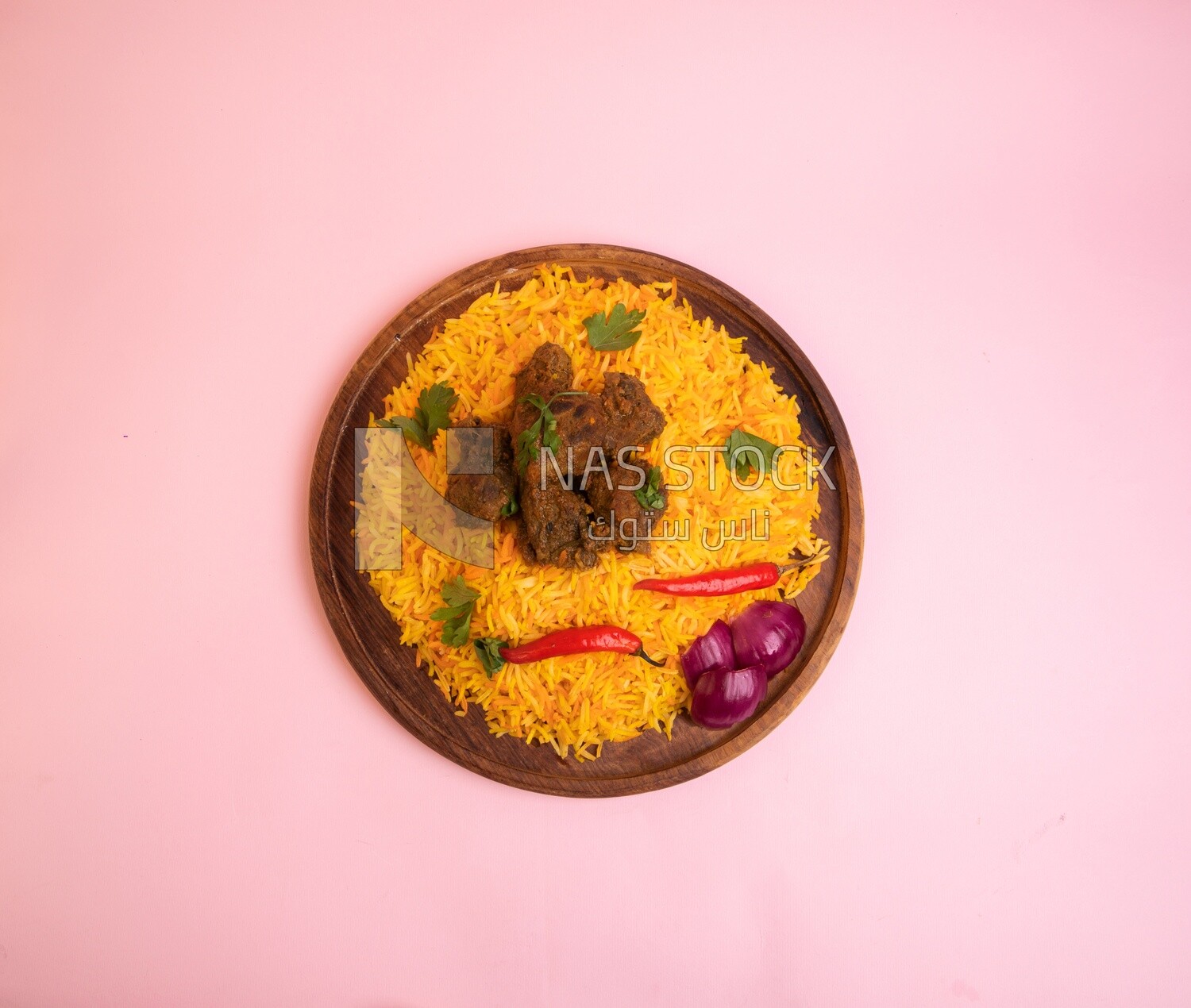 Wooden plate of delicious biryani rice with meat,  traditional Arabic dishes, Arabic food, popular dishes, delicious recipes and dishes, delicious food